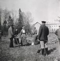 Grand Duchess Tatiana carrying a litter of dirt during internment at Tsarskoe-Selo 1917-1-.jpg